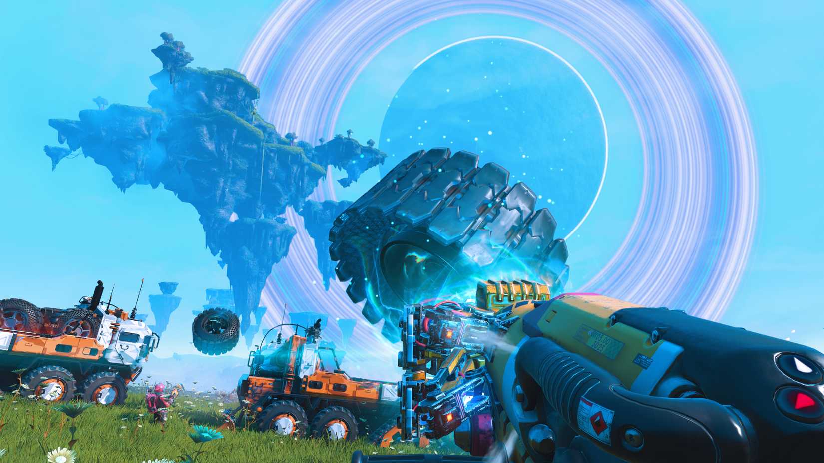 A POV shot of a No Mans Sky player lifting a huge tire into the air with their multi-tool's Gravitino Coil.