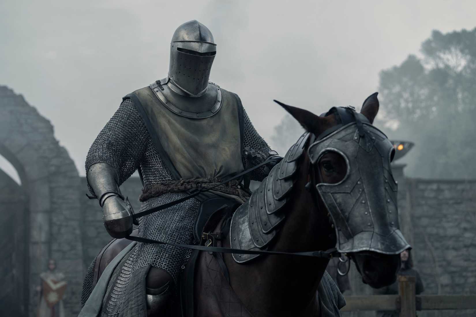 Peter Claffey on horseback in full helm and armor as Dunk in A Knight of the Seven Kingdoms
