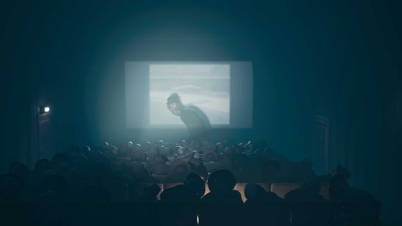 A monster walks through a cinema in Reanimal.