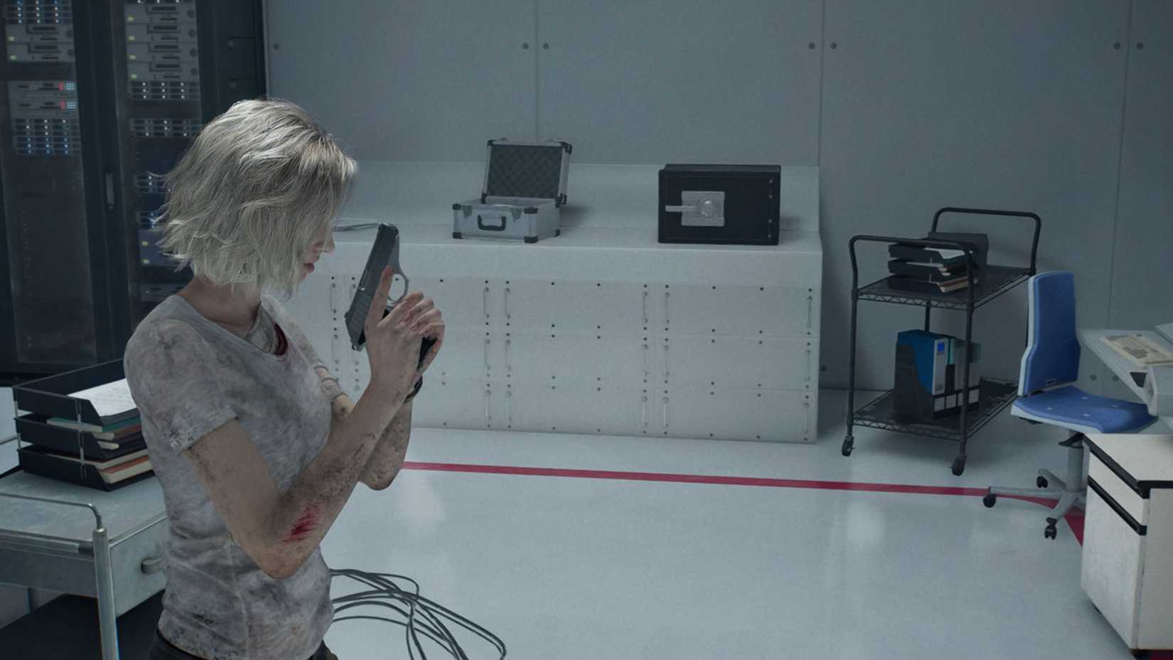 A Resident Evil Requiem screenshot showing Grace in front of the saf ein the Monitor Control Room