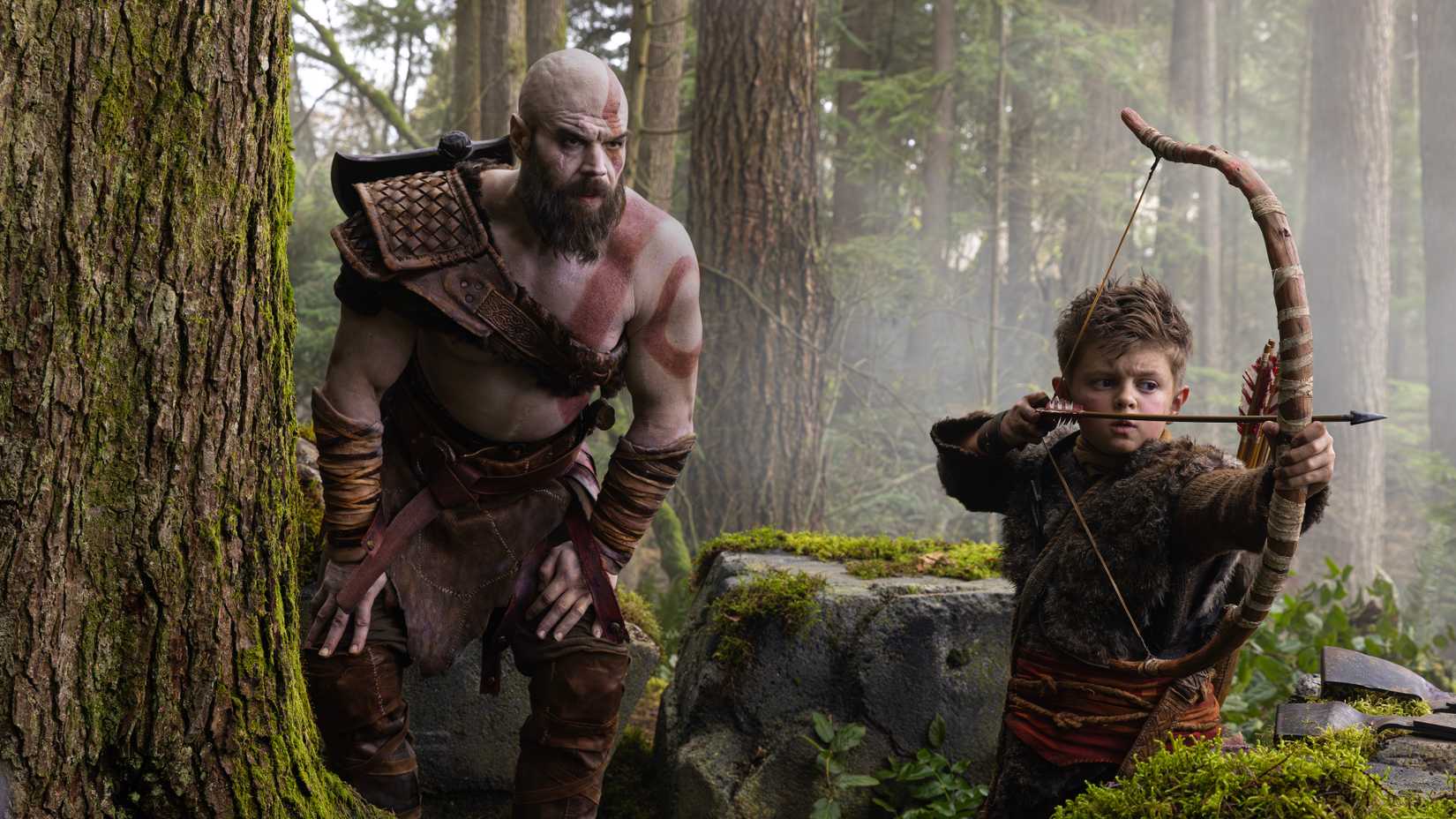 Ryan Hurst as Kratos and Callum Vinson as Atreus in God of War 