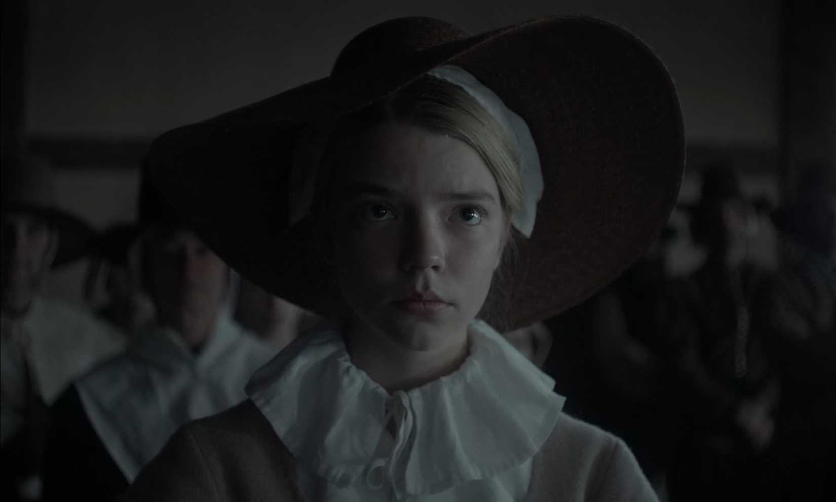 In another center-frame medium close-up shot from The Witch, Thomasin (Anya Taylor-Joy) looks slightly above the camera's eyeline