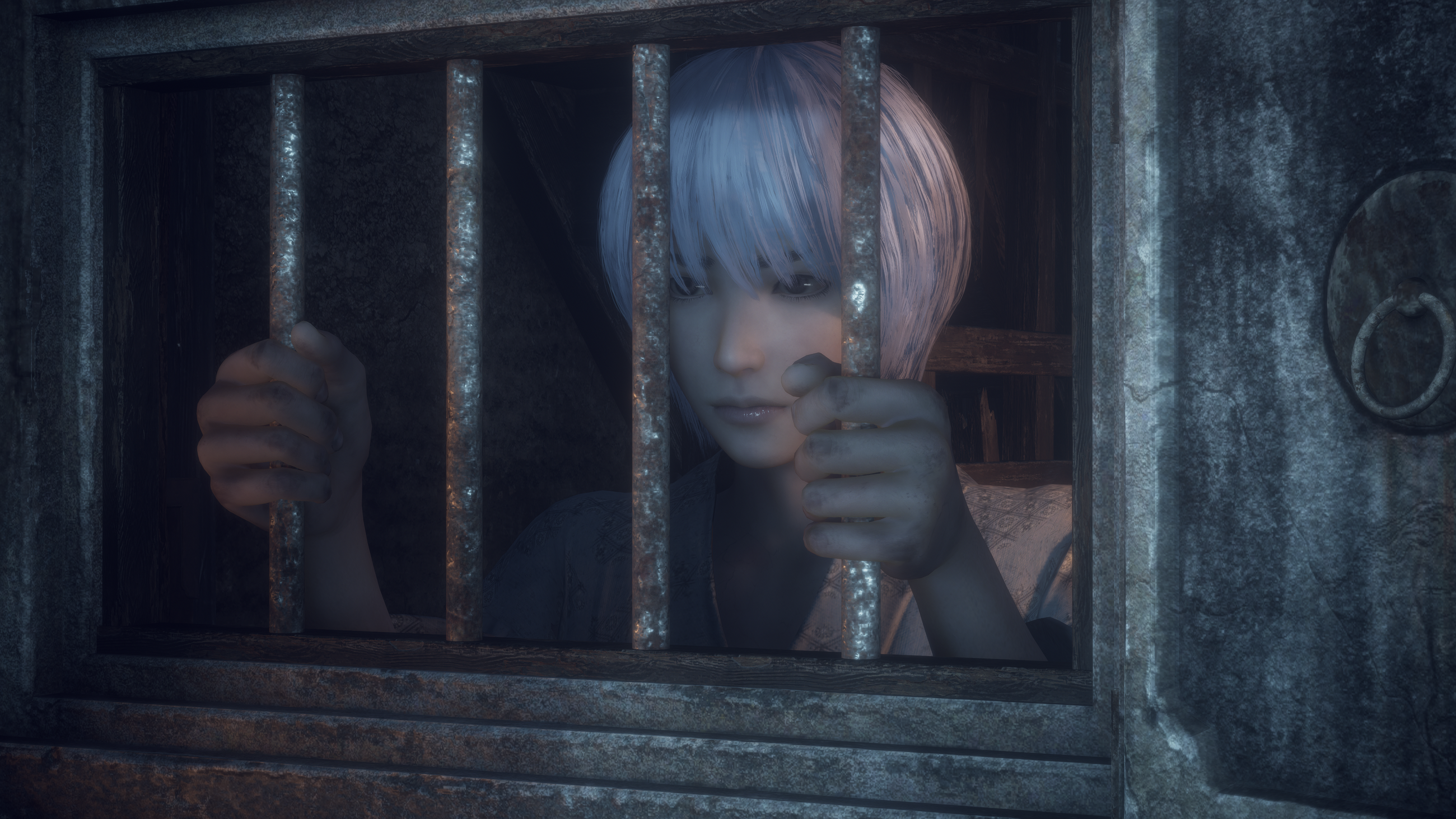 A spirit tries to escape prison in Fatal Frame 2 remake