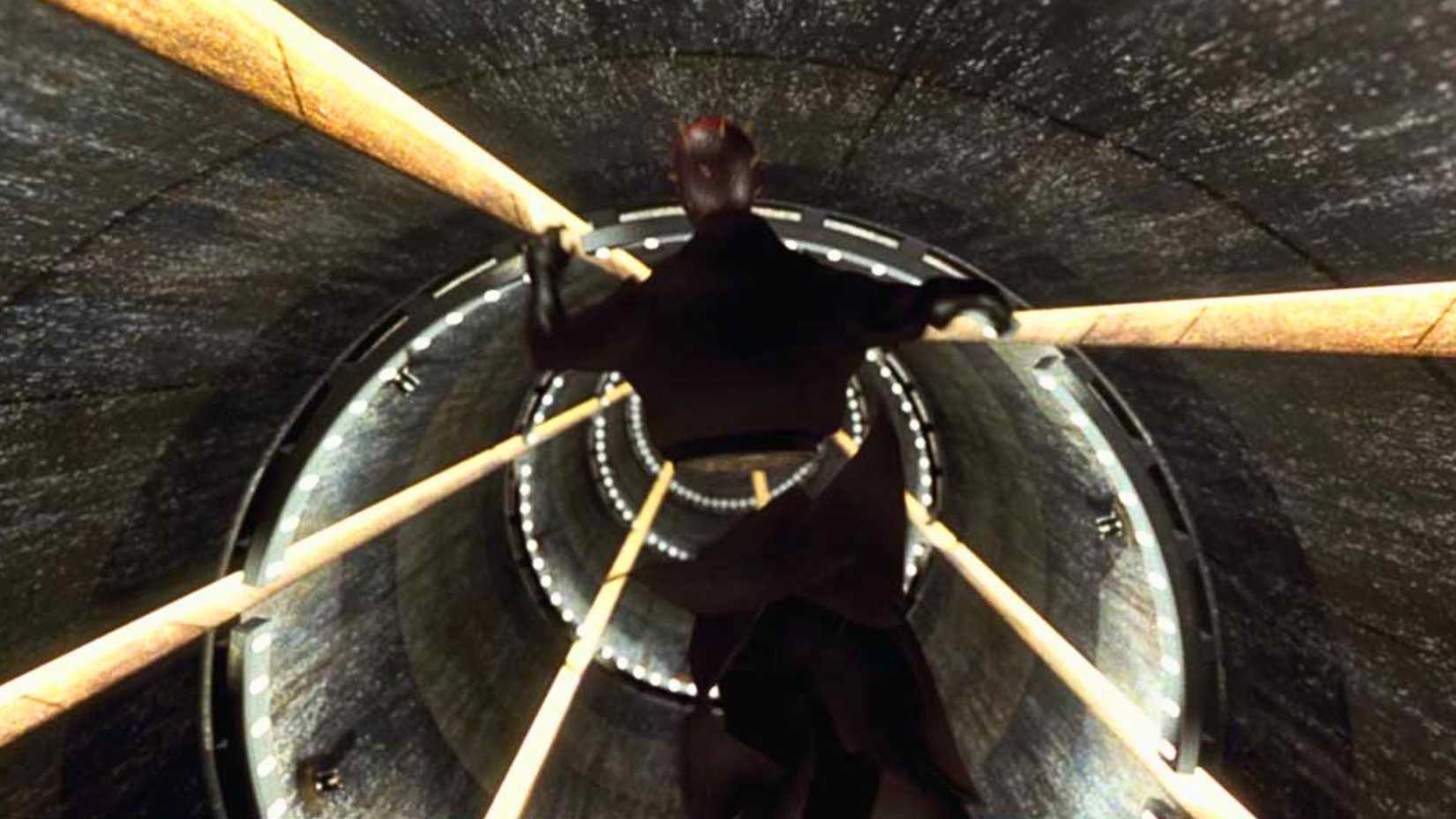 Image of Darth Maul, bisected, falling down a reactor shaft in Star Wars the Phantom Menace.