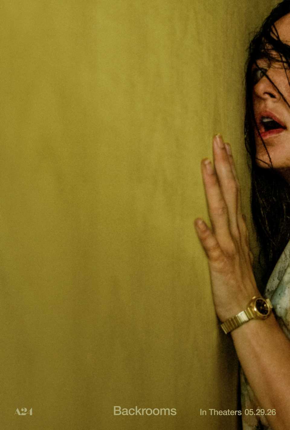 A woman pressed against a yellow wall in The Backrooms poster
