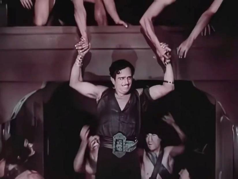 In a scene from the 1926 silent adventure film The Black Pirate, Douglas Fairbanks is lifted through levels of a ship by a series of soldiers' hands