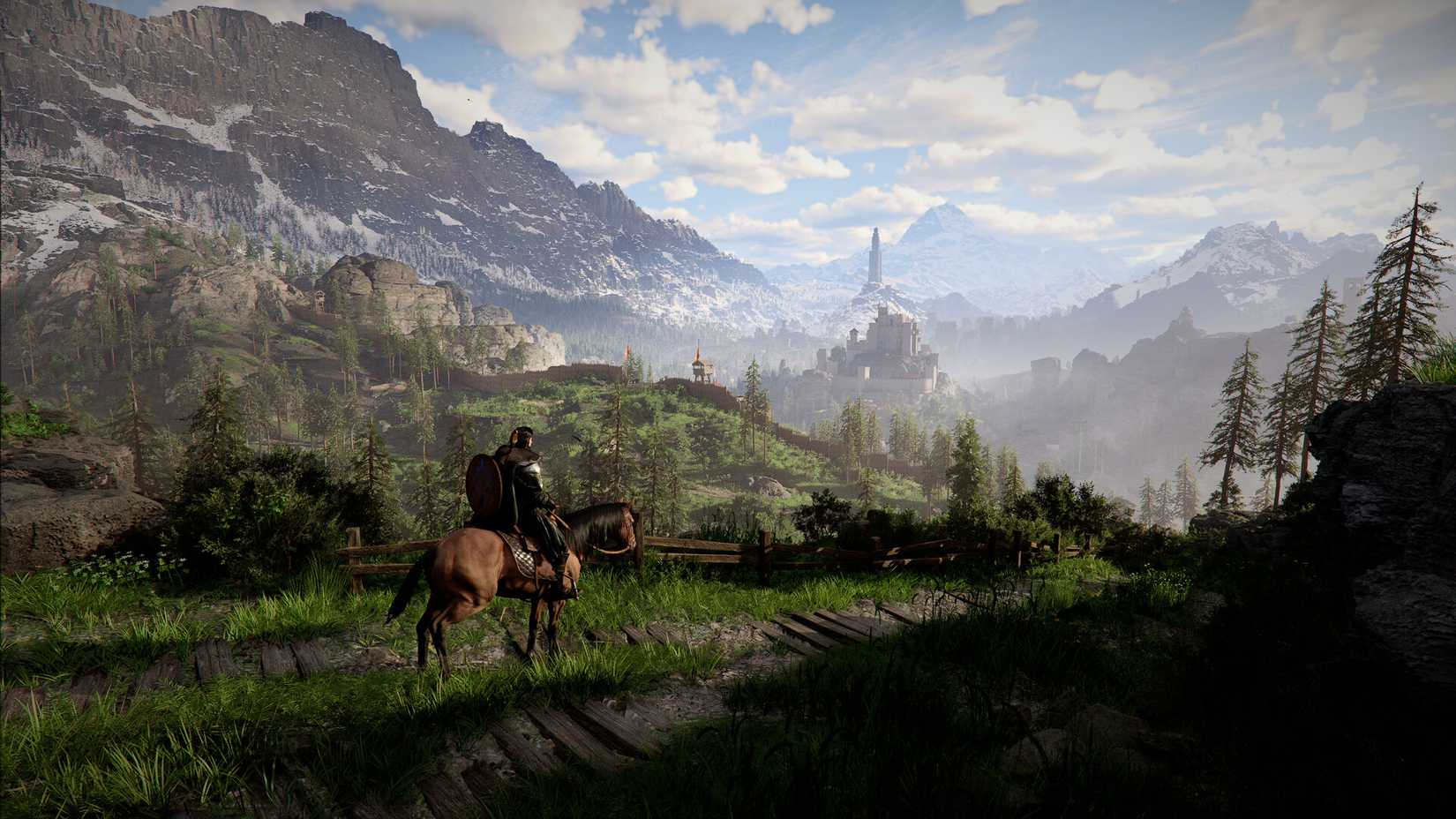 A man on horseback rides through a huge, spectacular fantasy mountain vista in Crimson Desert