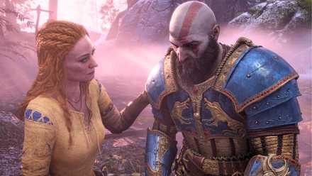 An image from God of War (2018) showing Faye, a red-haired woman with a yellow and blue tunic on, putting a hand on her husband, Kratos' plated shoulder.