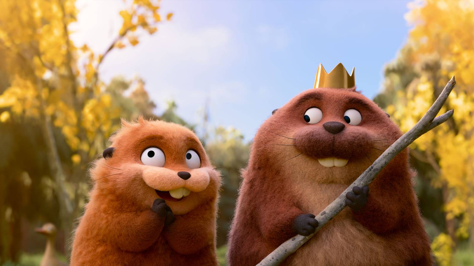 Two cute, fuzzy beavers — one of whom is actually a robot beaver housing a human mind — stand next to each other, smiling, in Pixar's Hoppers
