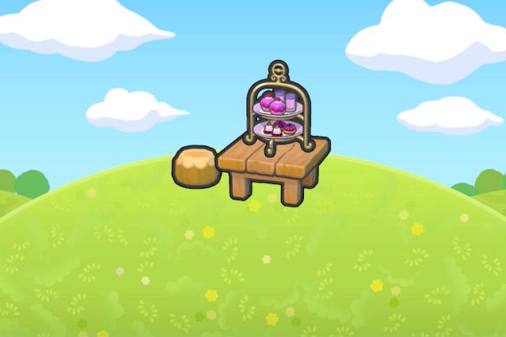 A tiered tower of purple colored desserts on top of a wooden table next to a stool on a grassy hill in Pokémon Pokopia.
