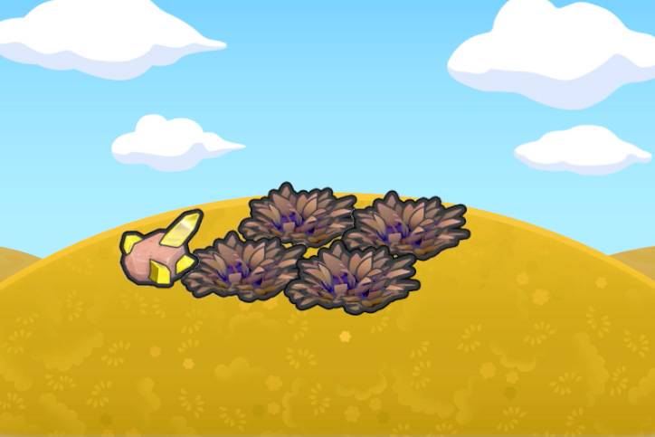 Browned dry grass next to a yellow rock in Pokopia.