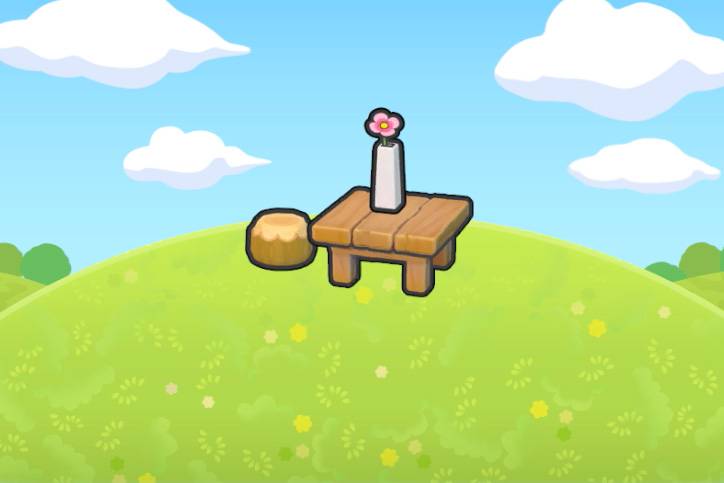 A flower in a vase on a table in Pokopia.