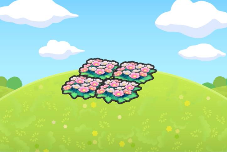 Four flower patches next to each other in Pokopia.