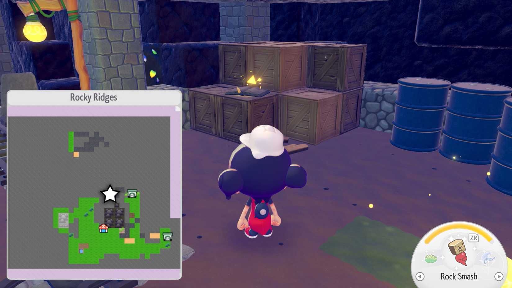 A book sitting on top of a bunch of crates in Pokopia.