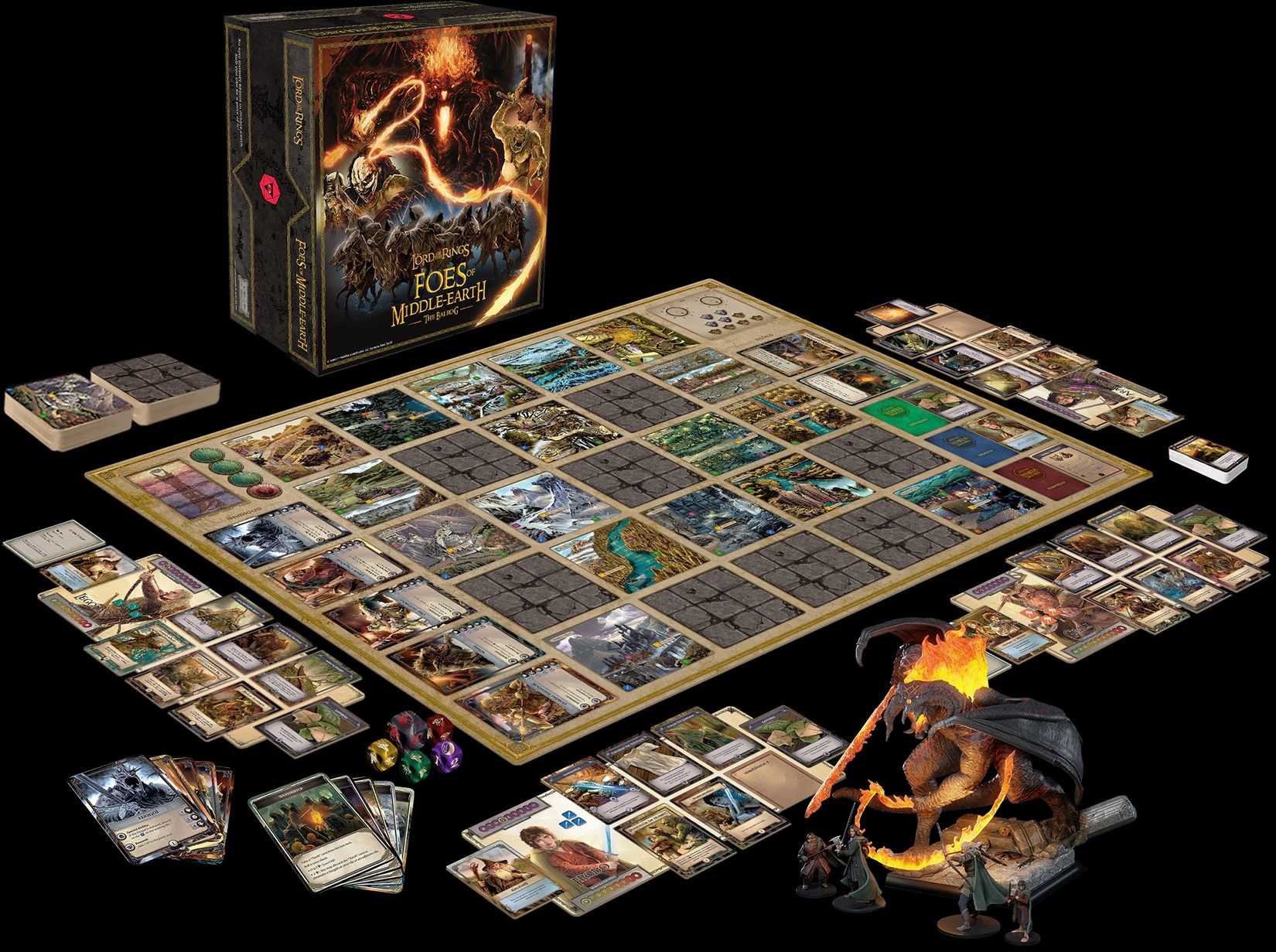 A game board laid out with pieces displayed along with the box and Balrog mini for Foes of Middle-earth