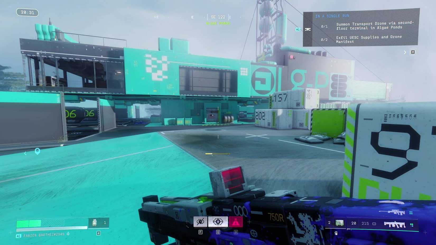 The player in Marathon looking at the building that houses the objective in Algae Ponds.