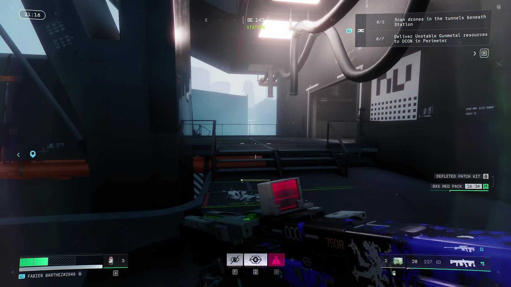 The player standing in front of the entrance to Station in Marathon.