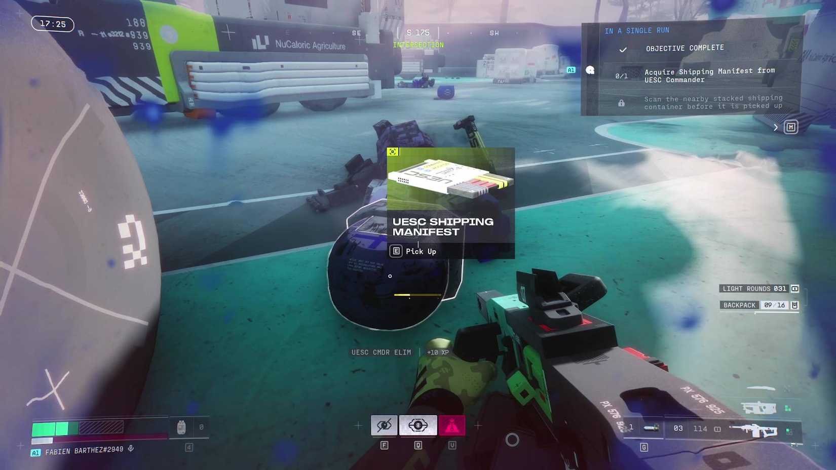 The player looking at the UESC Shipping Manifest next to the corpse of the UESC Commander.