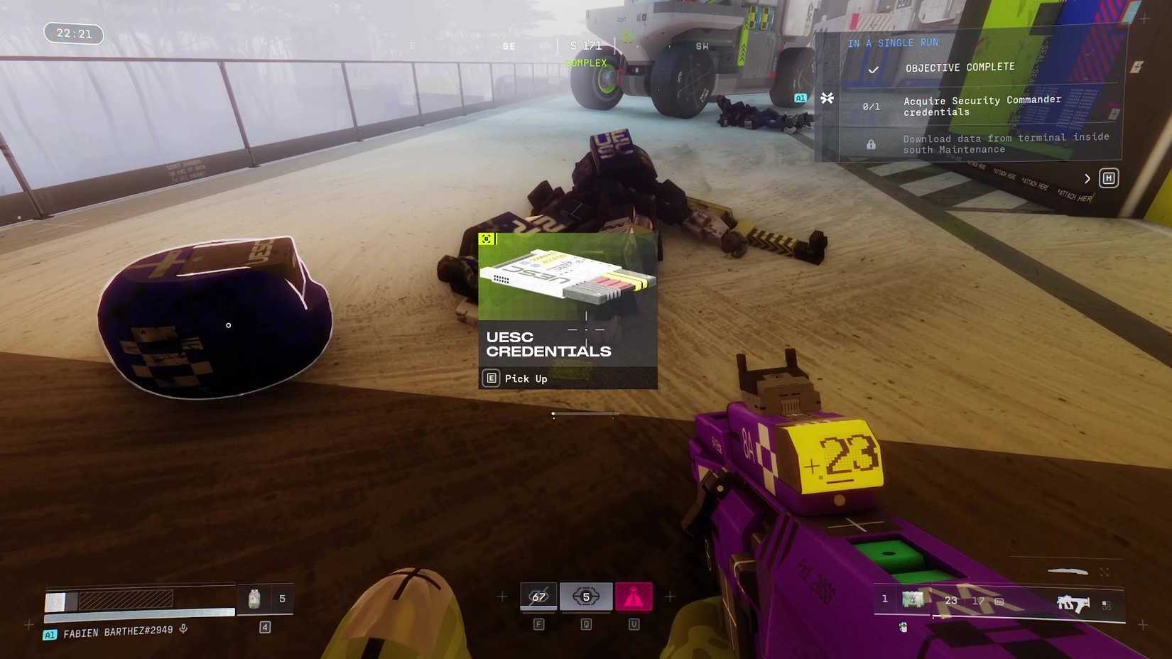 The player in Marathon looking at the UESC Credentials on the ground.