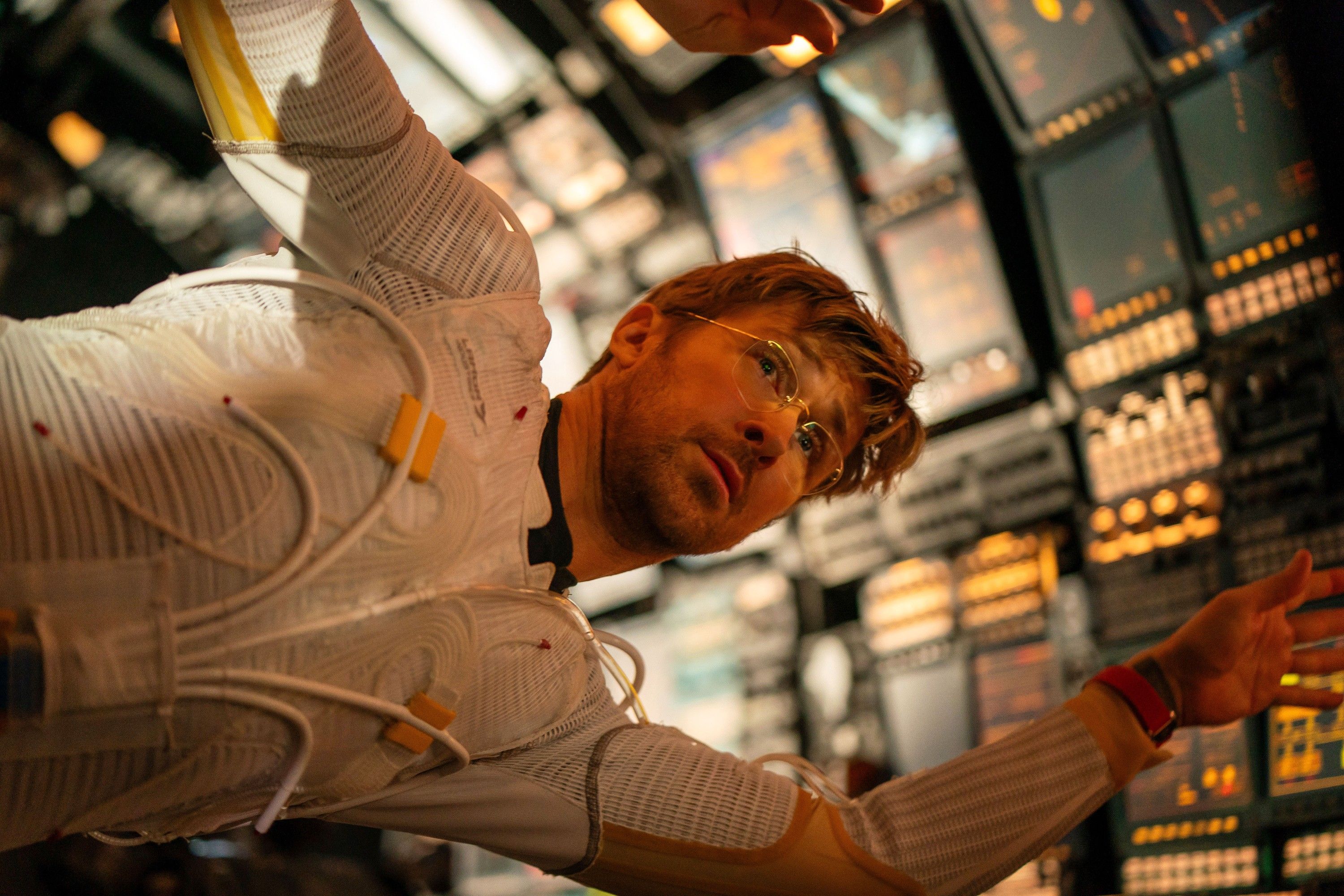 Astronaut Ryland Grace (Ryan Gosling) floats sideways in zero gravity in a spaceship in Project Hail Mary