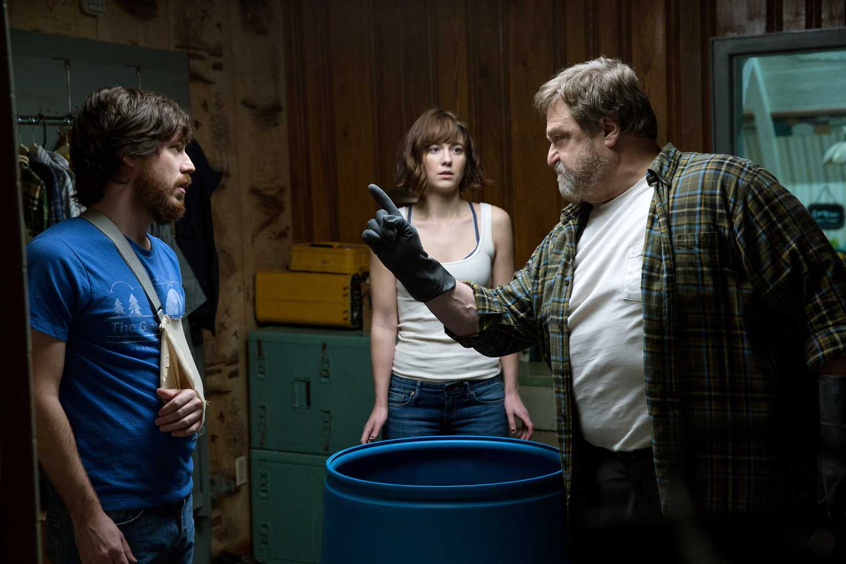 The three main characters stand over a barrel of acid