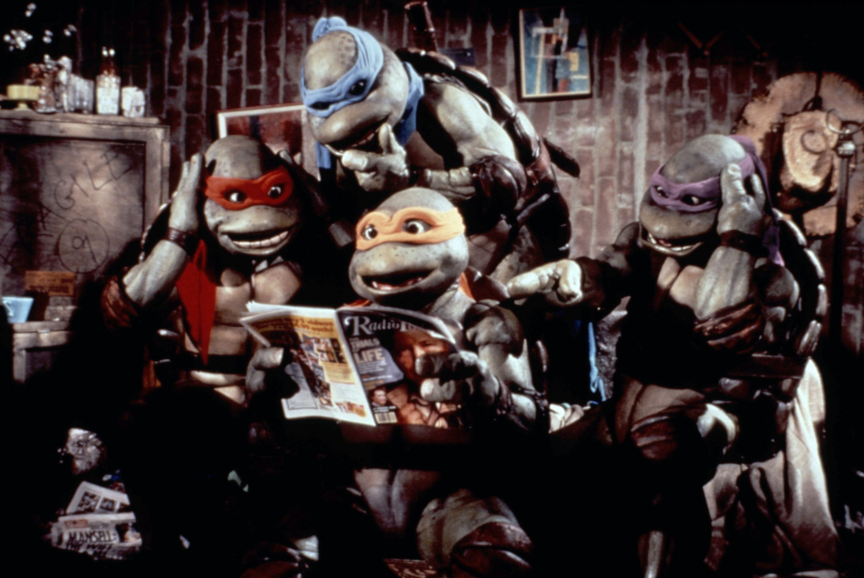 The Ninja Turtles read a magazine