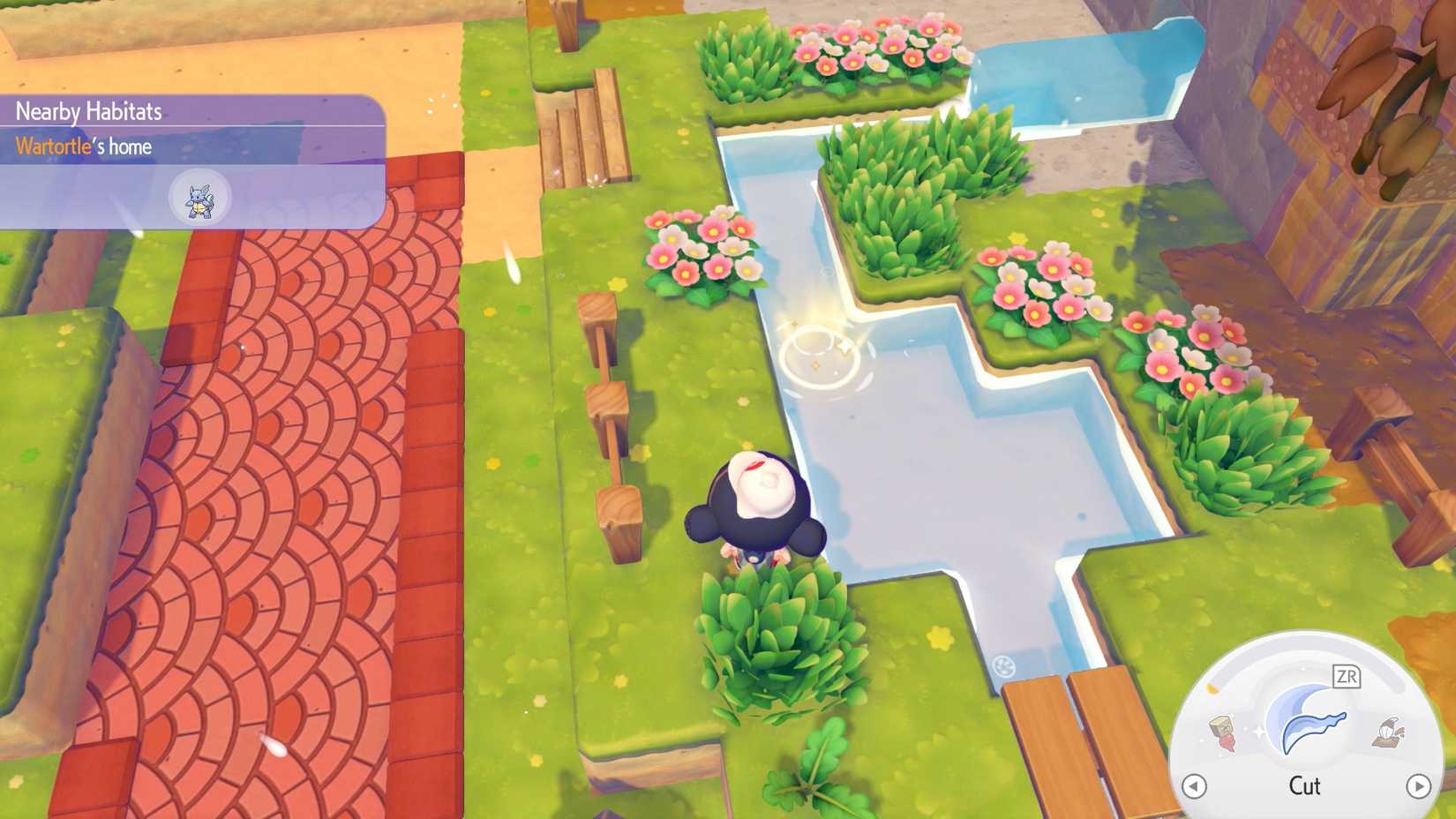 A golden glowing spot in the water in Pokopia