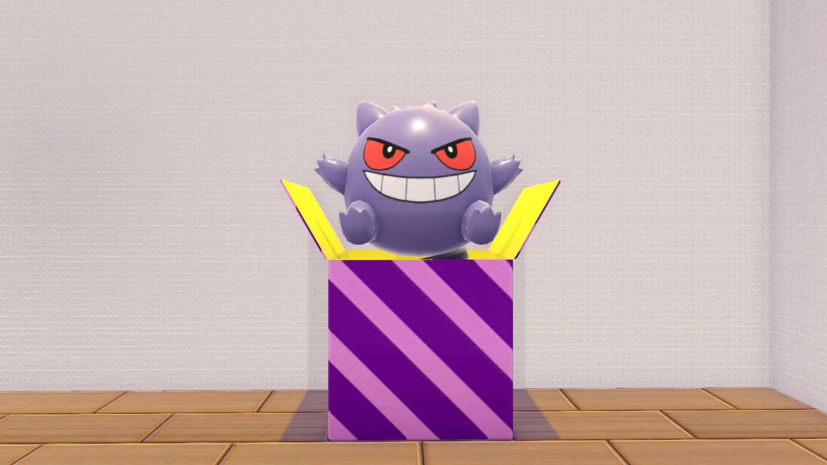 A pink- and purple-striped box with a Gengar popping out of it in Pokopia.