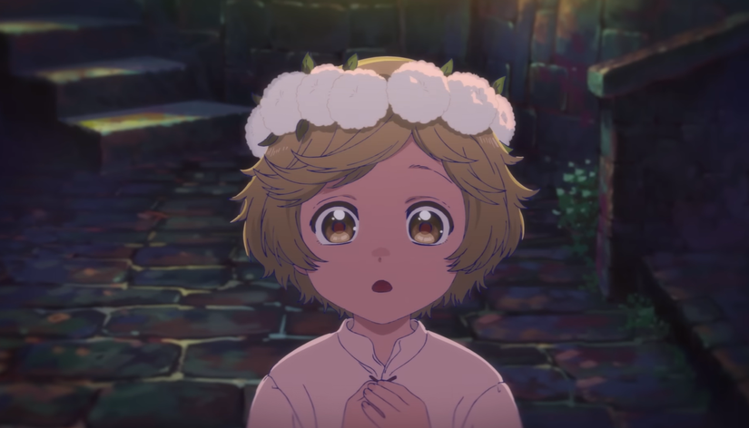 A child with a white flower headband looks ahead in awe in Witch Hat Atelier