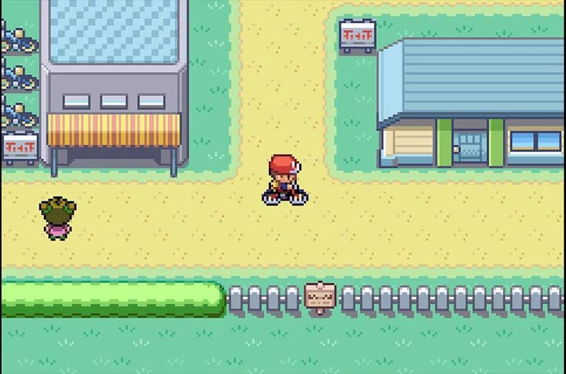 A trainer riding a bike in Pokemon FIreRed LeafGreen