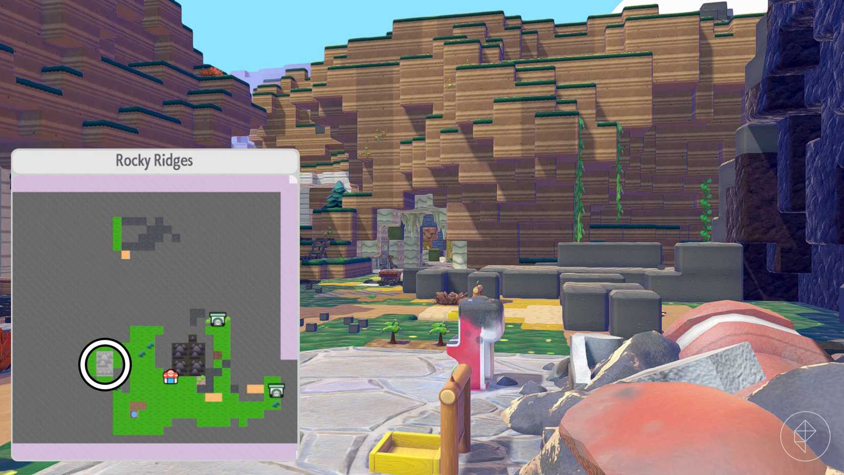 A montage showing a map of Rocky Ridges and the cave where players can gind Graveler