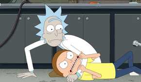Rick looks worried as he wrestles Morty to the floor in his garage lab