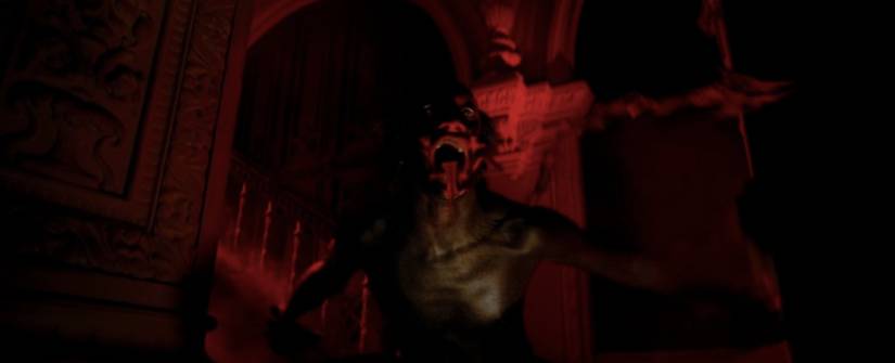 The demon opens its mouth wide with its tongue out