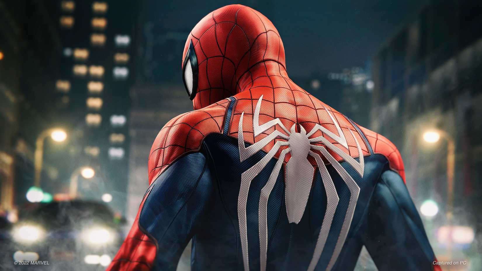 Spider-Man, seen from behind, looks back over his shoulder