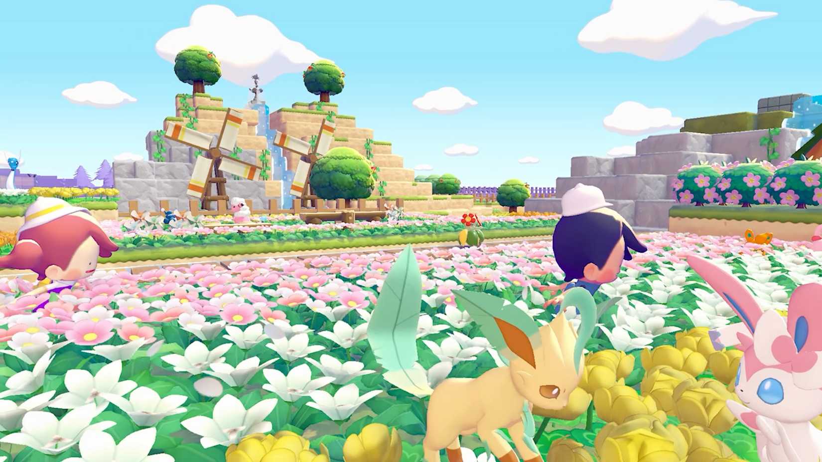 Pokémon explorando un campo de flores en Pokémon Pokopia