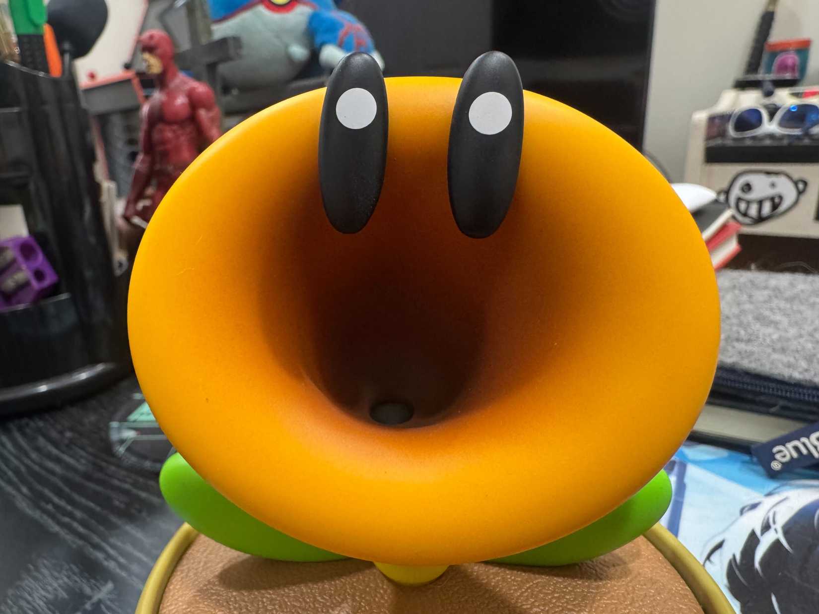 A Talking Flower toy is shown in close up.