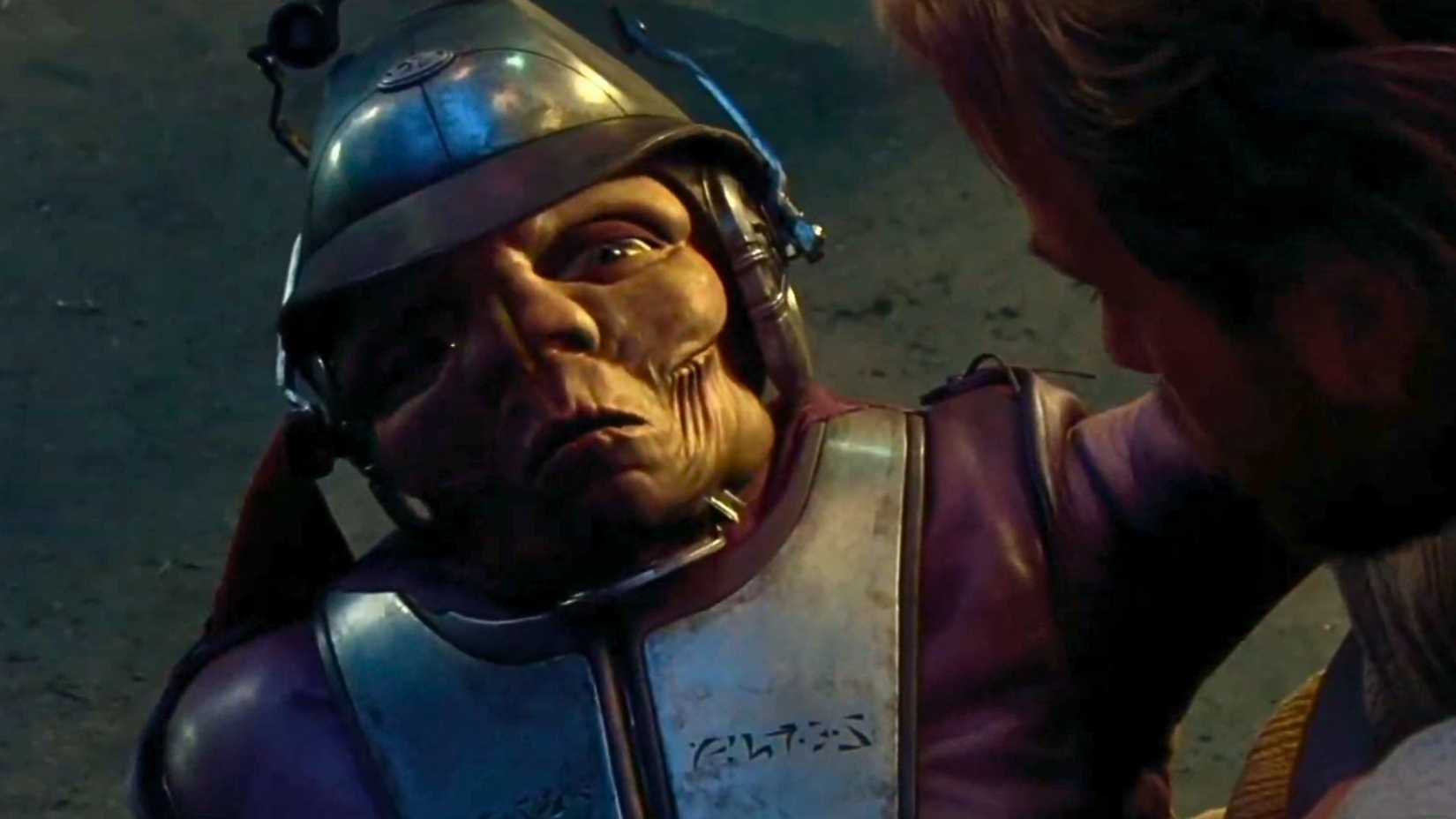 An image featuring Zam Wesell from Attack of the Clones. She has been shot with a poison dart, and her features are twisted into a grimace.