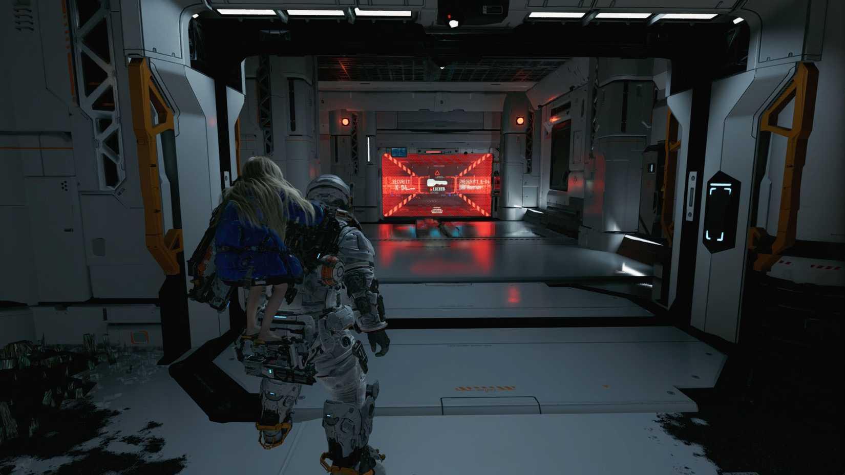 A man carrying a girl on his back looking toward a red gate in a futuristic building in Pragmata.