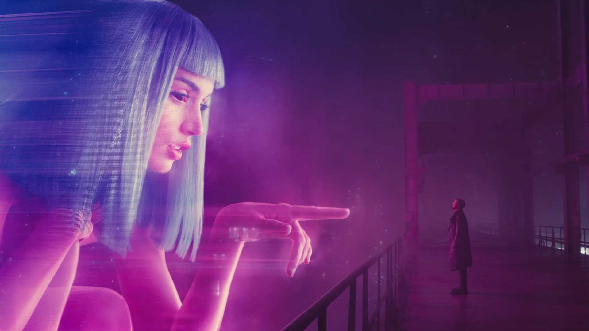 Still from Blade Runner 2049 featuring K and a blown up hologram of the fictional Joi AI.