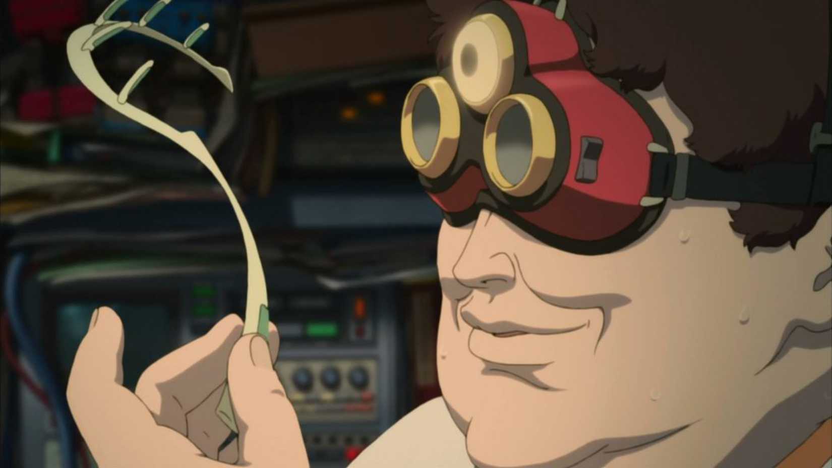 Scene from the anime movie Paprika featuring Dr. Tokita holding the DC Mini device.
