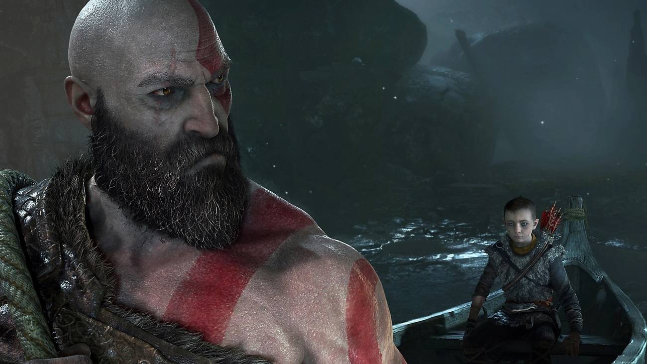 Kratos looks back at Atreus in a boat in God of War