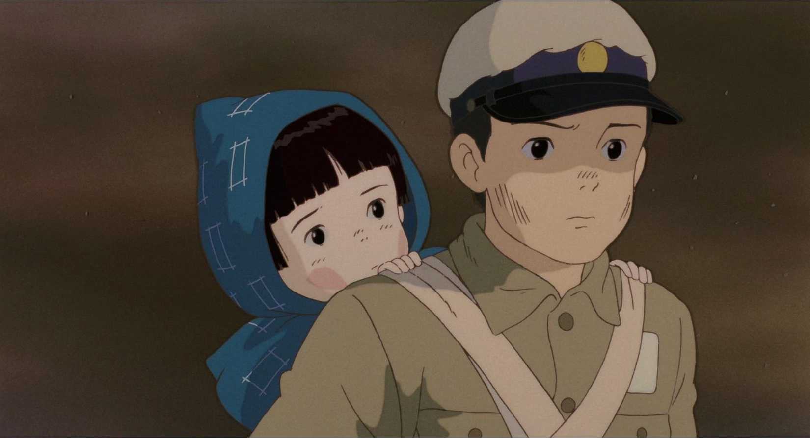 A young boy carries his baby sister on his back in Grave of the Fireflies