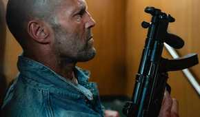 Jason Statham holding an automatic weapon in Mutiny