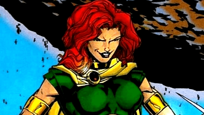 A red-headed woman wearing green stands triumphant, this is DC's Maxima
