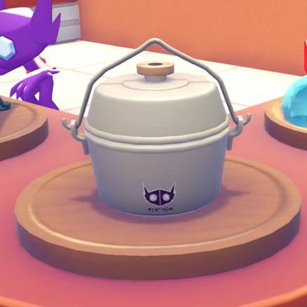 A silver cooking pot with a top handle and a Sableye logo on it in Pokopia
