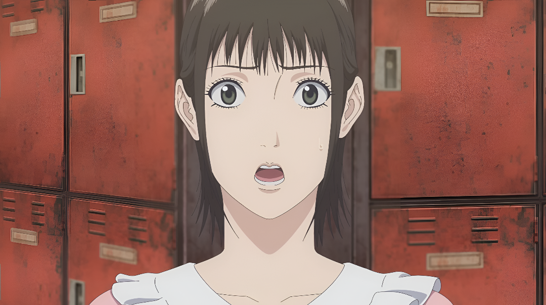 A young, brown haired woman looks ahead with her mouth open in shock in Liar Game