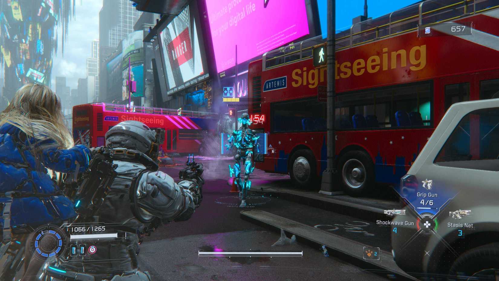 Astronaut Hugh and android Diana fighting a robot in Times Square on the moon in a screenshot from Pragmata