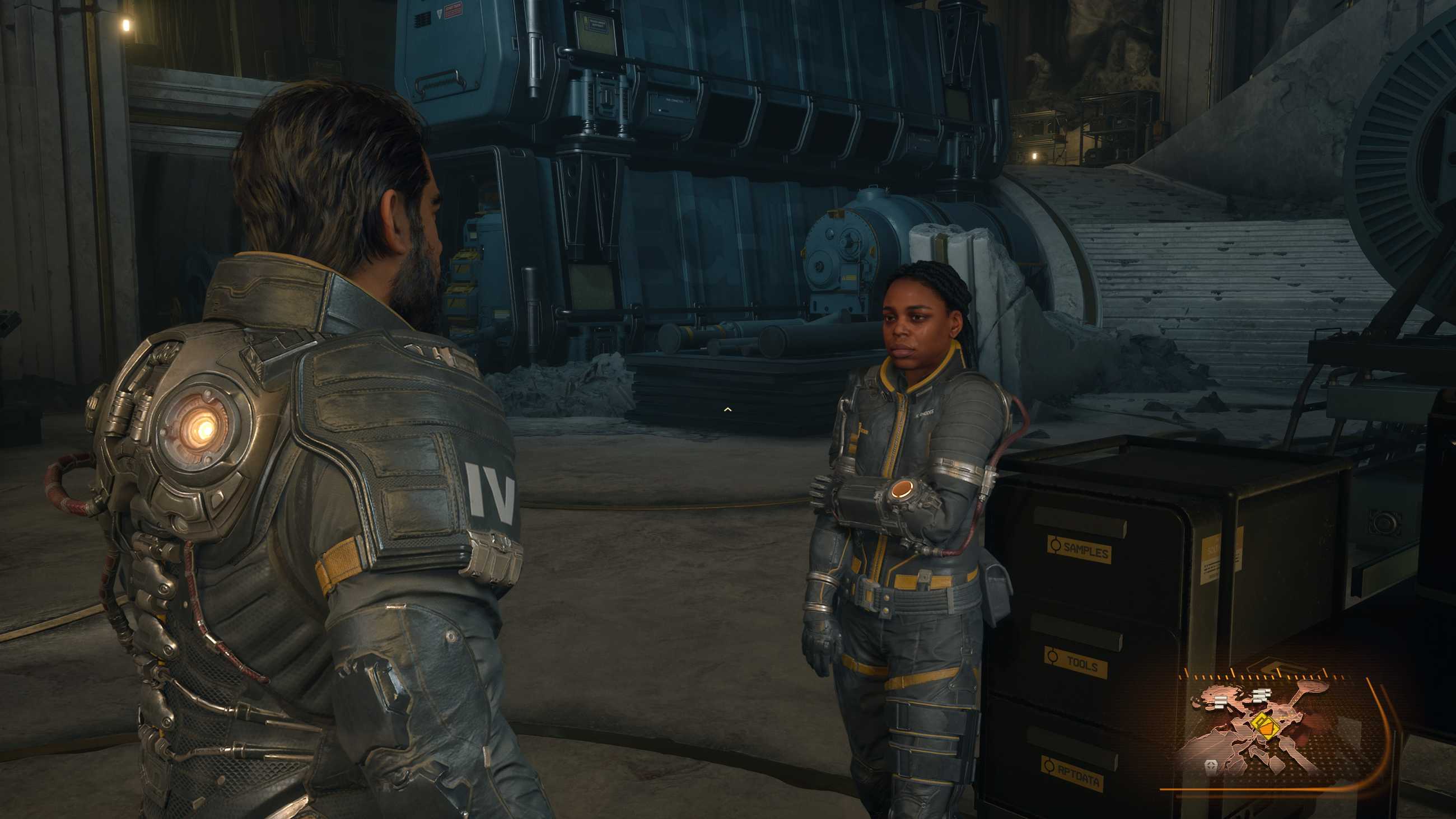 Devraj talks to a crewmate in Saros.