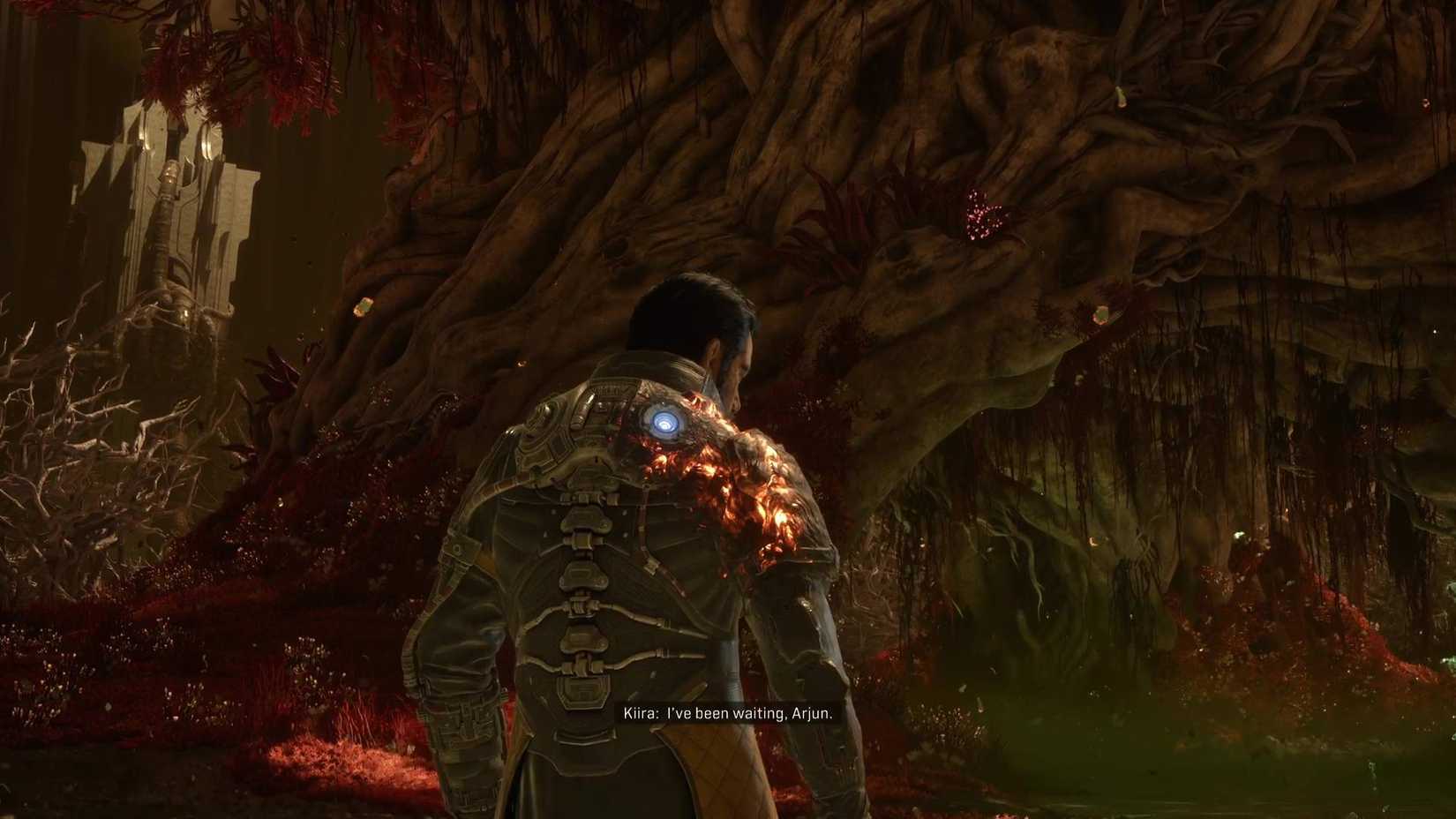 Arjun at the foot of the red tree in Saros.