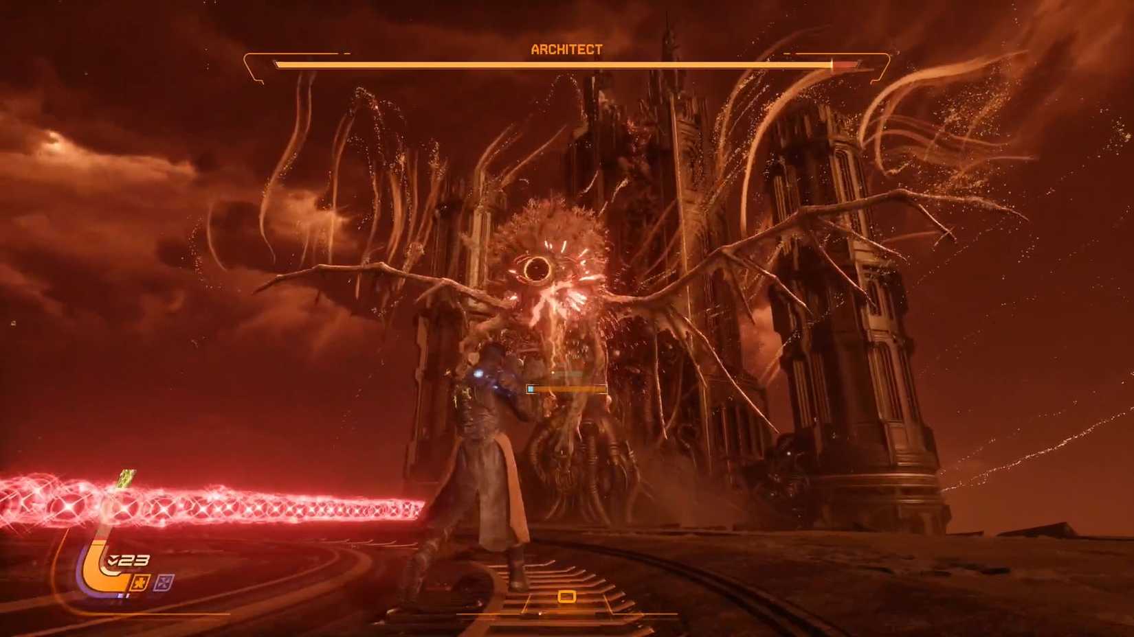 A Saros screenshot showing the Architect standing in front of an old building at the top of the Desecrated Fortress